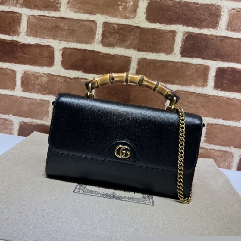 G*u*i top handle bags